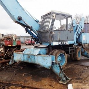 foto Umschlag 19t bagger Fuchs 714 ausziehbare Magnet greifer