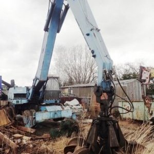 foto Umschlag 19t bagger Fuchs 714 ausziehbare Magnet greifer