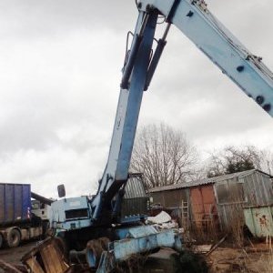 foto Umschlag 19t bagger Fuchs 714 ausziehbare Magnet greifer